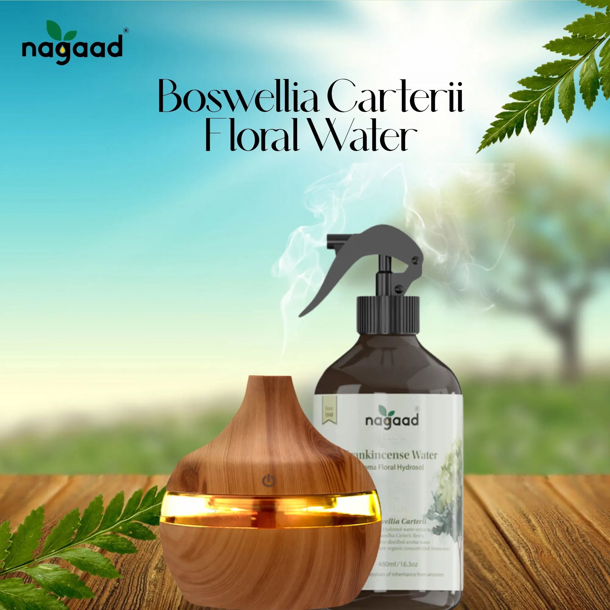 Green palm leaf beside blank white cards on a plain background.