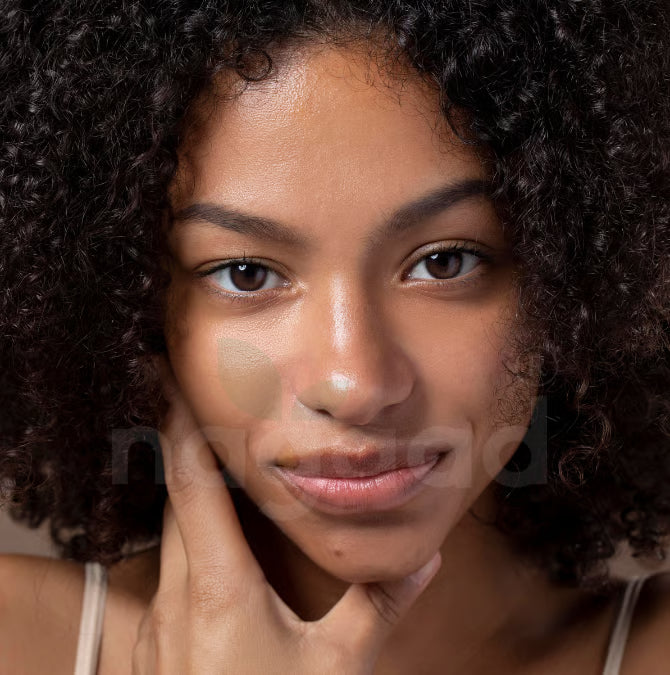 Frankincense essential oil bottle and diffuser with text overlay on a blurred background.
